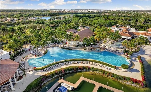 view of pool featuring a water view