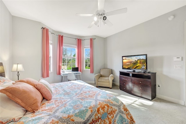 bedroom with light carpet and ceiling fan