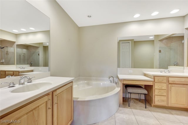 bathroom with vanity, plus walk in shower, and tile patterned flooring