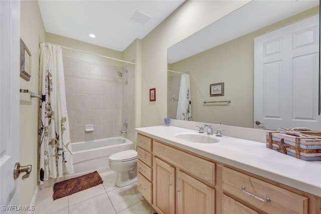 full bath featuring vanity, visible vents, shower / tub combo, tile patterned floors, and toilet