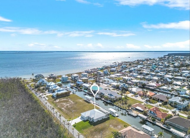 bird's eye view with a water view