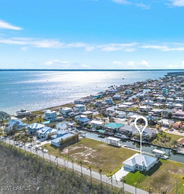 drone / aerial view featuring a water view