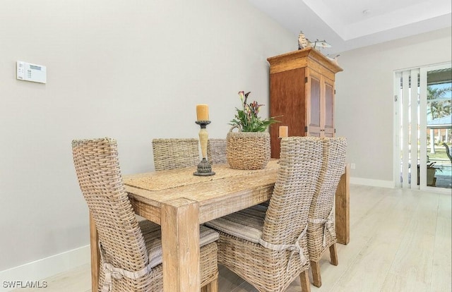 dining room with light wood-type flooring