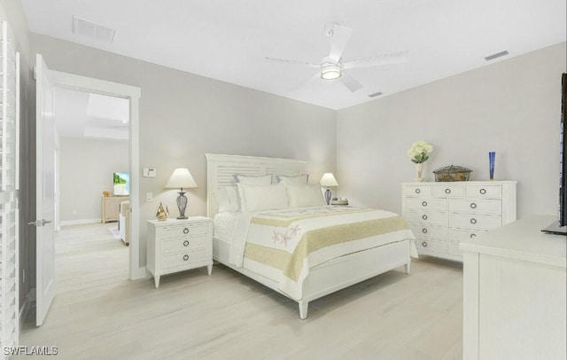 bedroom featuring ceiling fan and light hardwood / wood-style floors