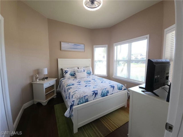 bedroom featuring dark hardwood / wood-style floors