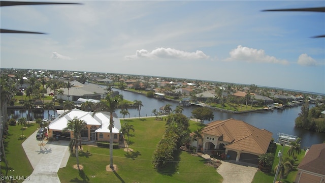 bird's eye view with a water view