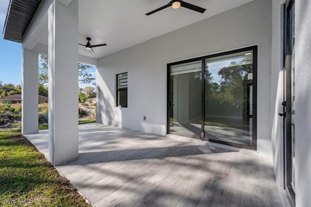 view of patio / terrace featuring ceiling fan