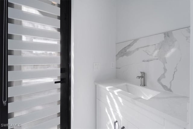 bathroom with vanity and wine cooler