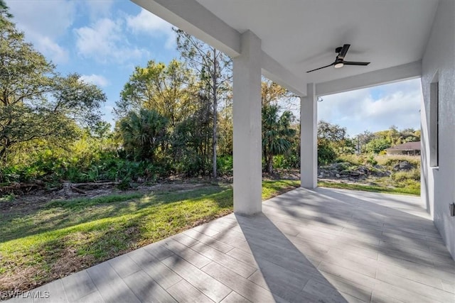 view of patio / terrace featuring ceiling fan