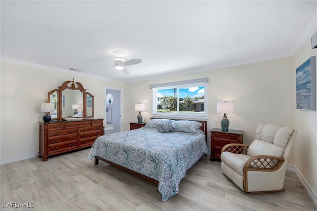 bedroom with ornamental molding, ceiling fan, and light hardwood / wood-style floors