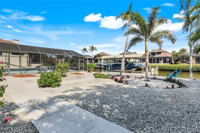 view of home's community with a water view