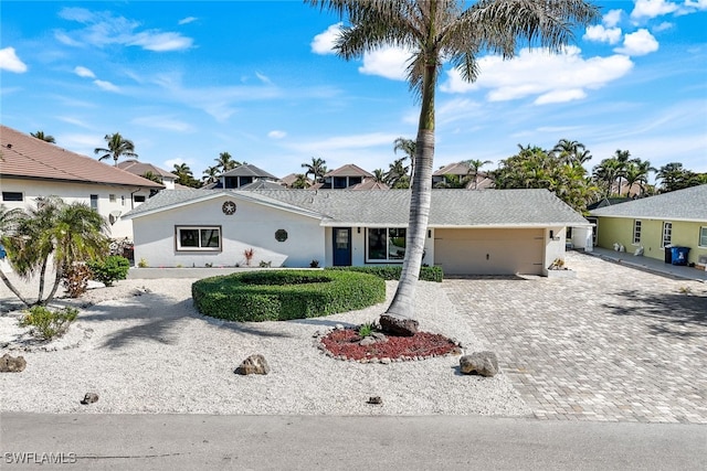 view of front of property featuring a garage