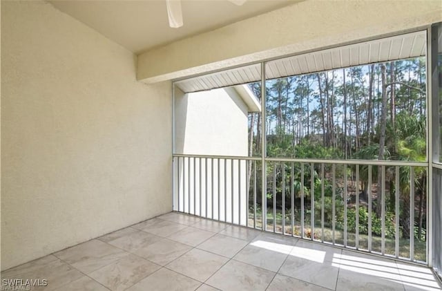 exterior space with ceiling fan