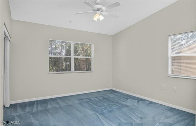 interior space featuring ceiling fan