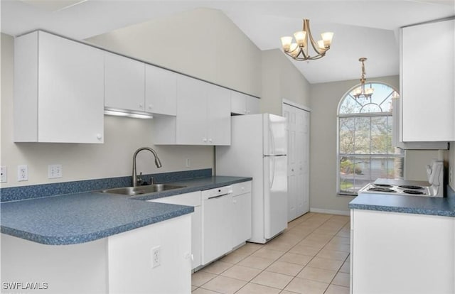 kitchen featuring hanging light fixtures, white cabinetry, sink, and a notable chandelier