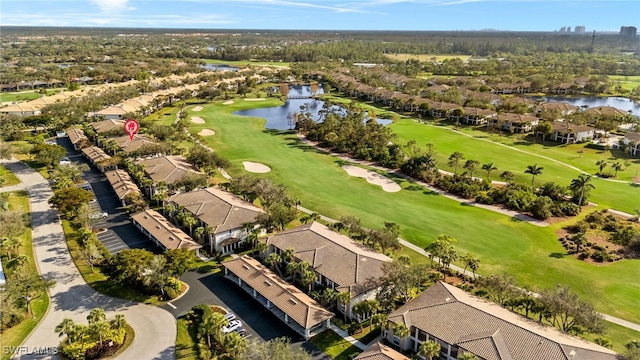 birds eye view of property featuring a water view, a residential view, and golf course view