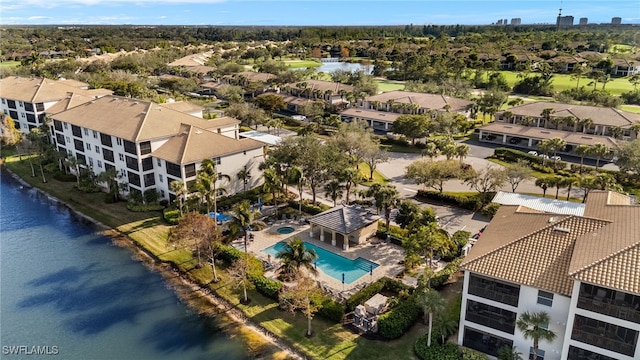 bird's eye view with a water view and a residential view