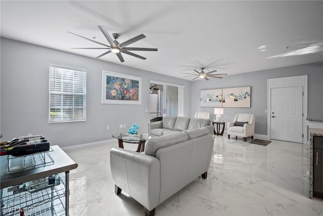 living room featuring ceiling fan