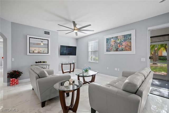 living room with ceiling fan