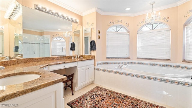 full bathroom with a chandelier, a shower stall, vanity, and tile patterned floors