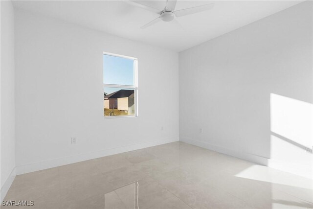 unfurnished room featuring ceiling fan