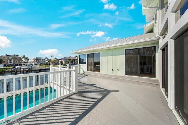 exterior space featuring a residential view and a water view