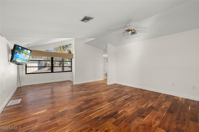 unfurnished living room with hardwood / wood-style flooring, vaulted ceiling, and ceiling fan