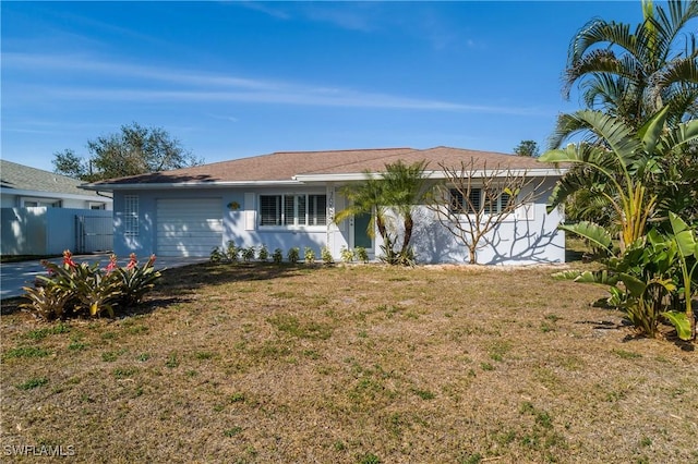 ranch-style house with a front yard