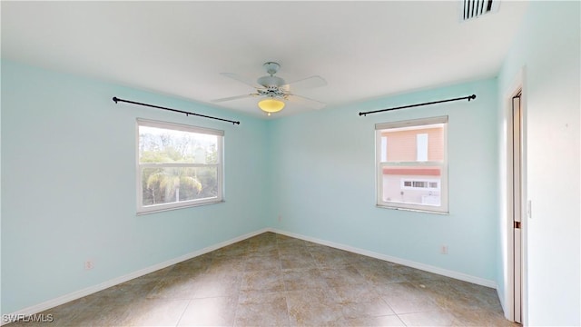 unfurnished room featuring ceiling fan