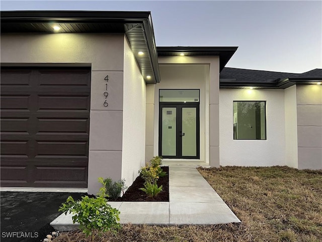 property entrance featuring a garage