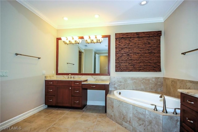 full bath featuring ornamental molding, a garden tub, vanity, and baseboards