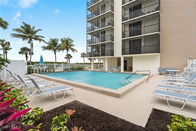 view of swimming pool featuring a patio