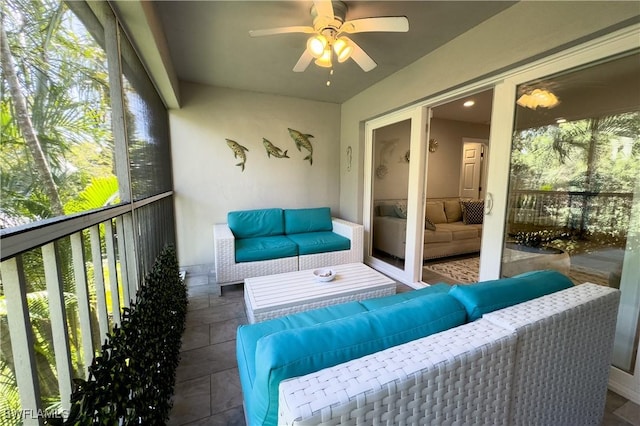 sunroom / solarium with ceiling fan