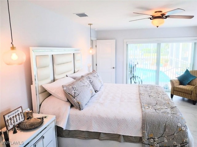 bedroom with ceiling fan and access to exterior