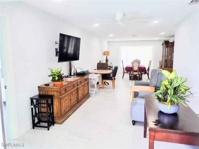 living room featuring ceiling fan