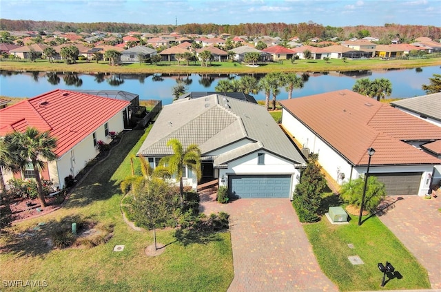 drone / aerial view featuring a water view