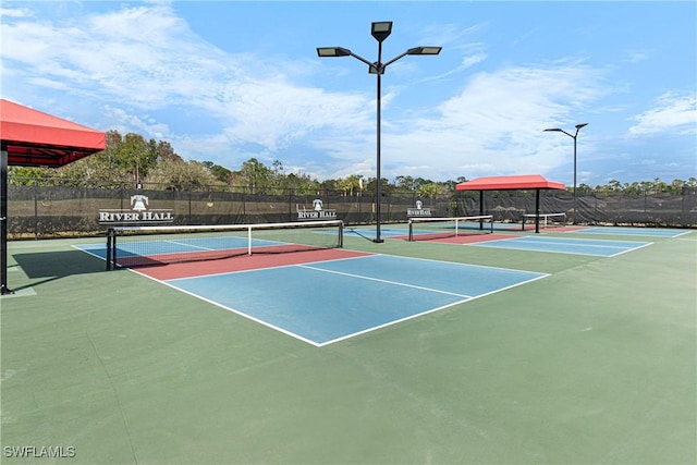 view of sport court with fence and community basketball court