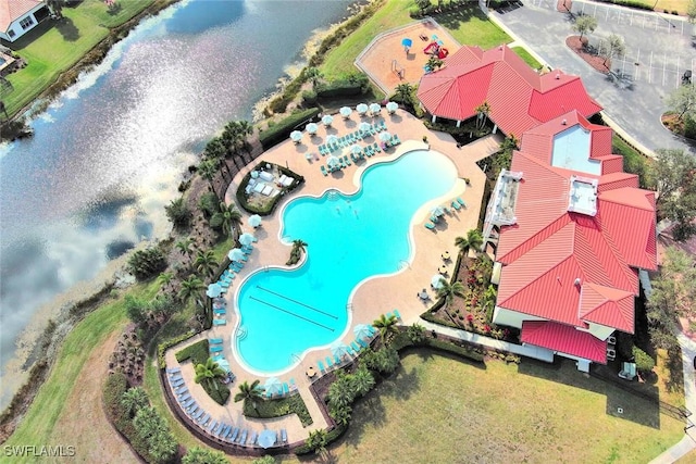 drone / aerial view featuring a water view