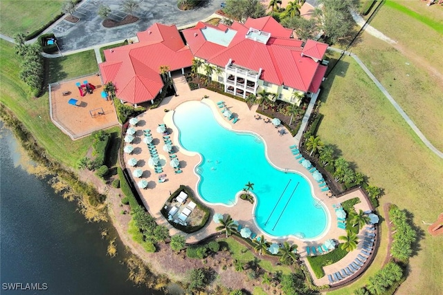 birds eye view of property featuring a water view