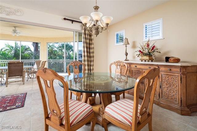 720 Waterford Dr Unit 303, Naples, FL 34113 - tiled dining space featuring ceiling fan with notable chandelier