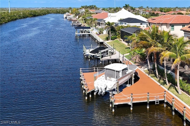 dock area featuring a water view and boat lift