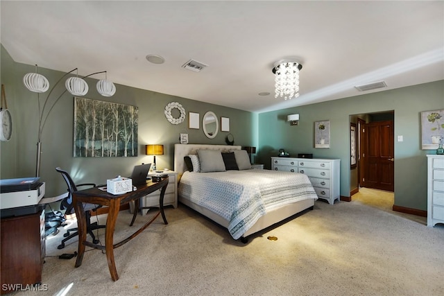 bedroom with visible vents and baseboards