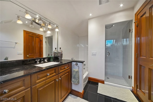 full bath with visible vents, tile patterned floors, vanity, a shower stall, and a bath