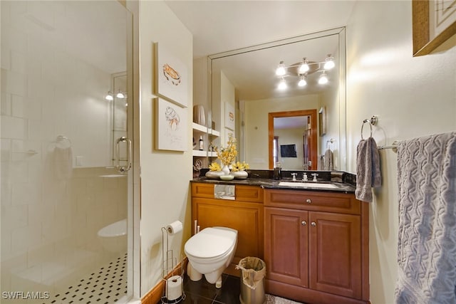 bathroom with toilet, a stall shower, tile patterned floors, and vanity