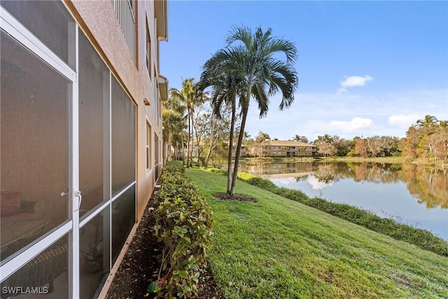 view of yard with a water view