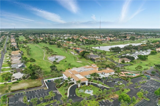 9621 Spanish Moss Way Unit 3813, Bonita Springs, FL 34135 - aerial view of property and surrounding area with a large body of water, nearby suburban area, and a local golf course