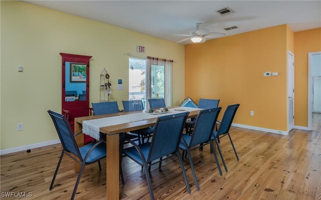 dining area featuring ceiling fan and light hardwood / wood-style flooring