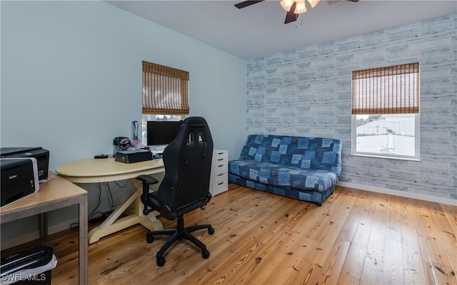 office featuring ceiling fan and light wood-type flooring