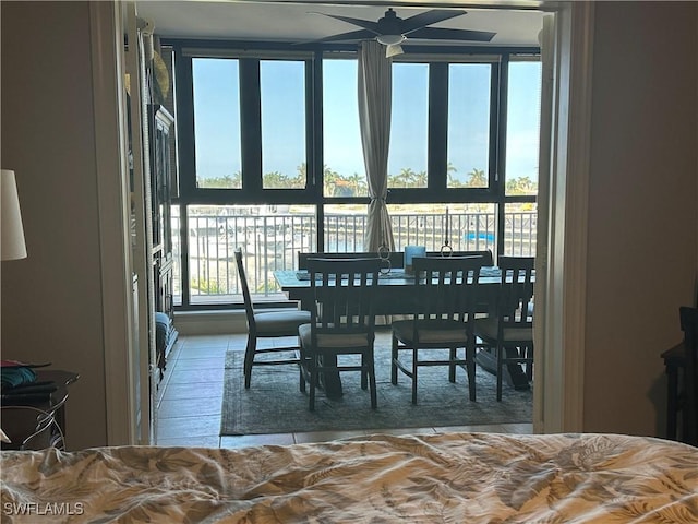 dining room with ceiling fan and hardwood / wood-style floors