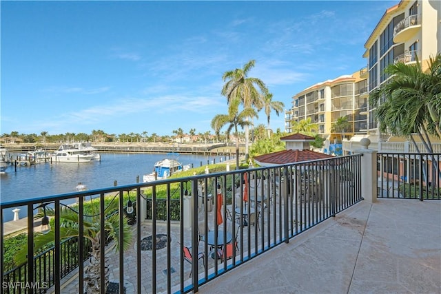 balcony featuring a water view